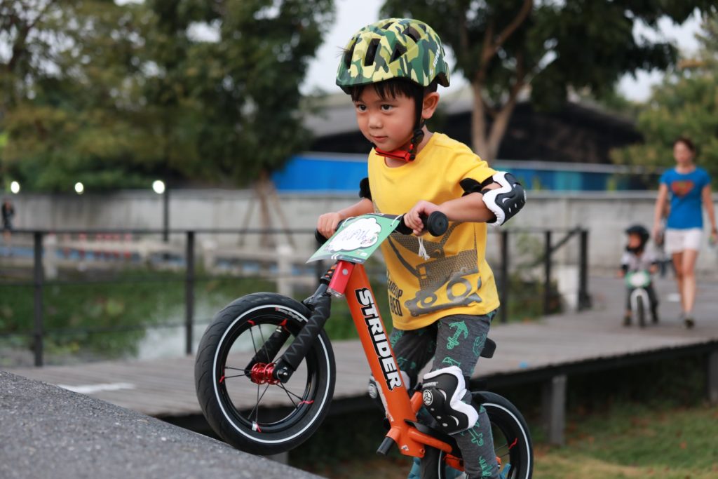 Kids riding a bike