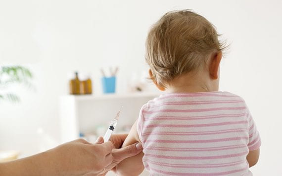 child being vaccinated