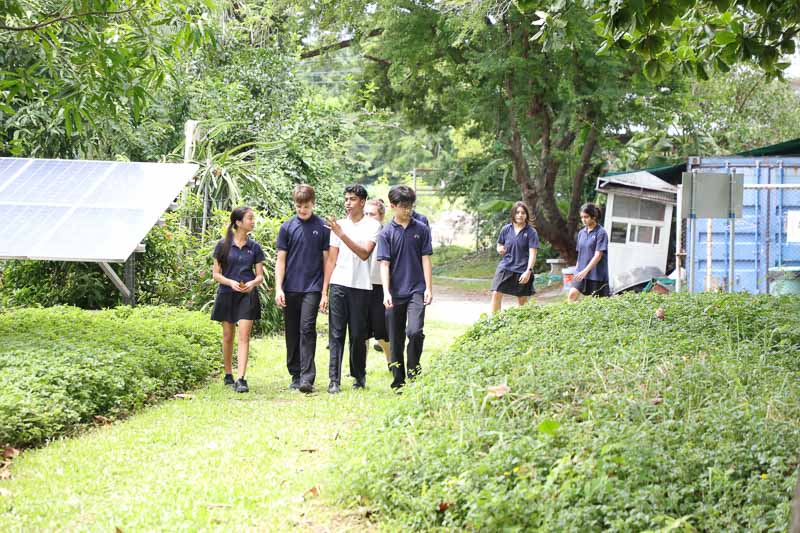 Bangkok Patana - students chatting as they discussed re solar panels