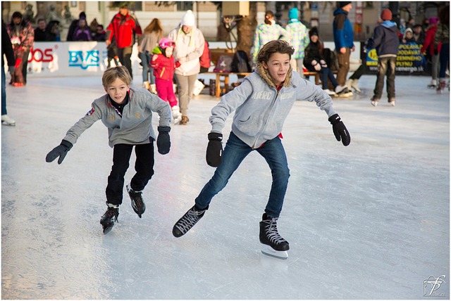 2 boys ice skating